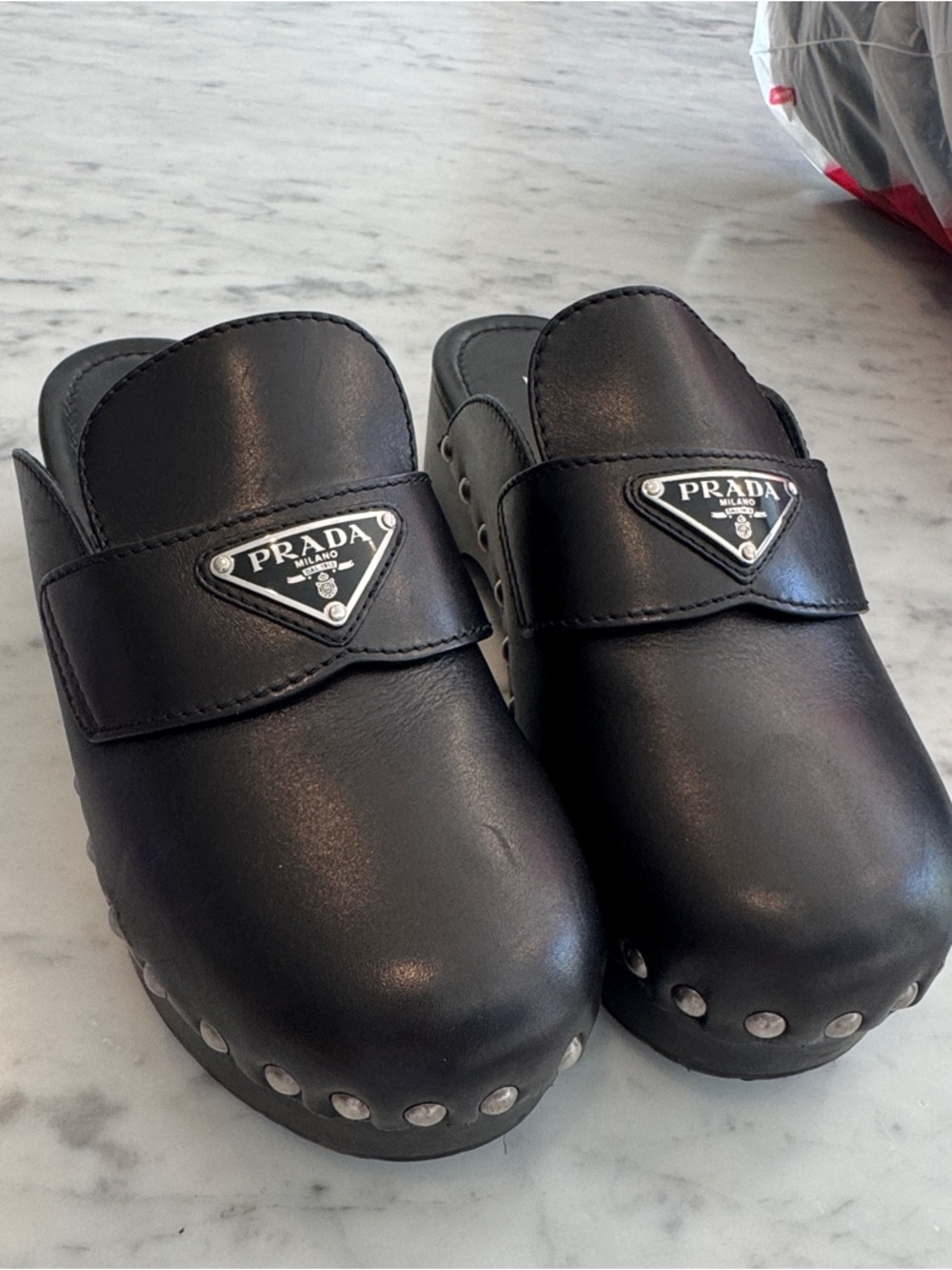 Prada women’s Black Leather Studded Clogs mules slides platform leather
